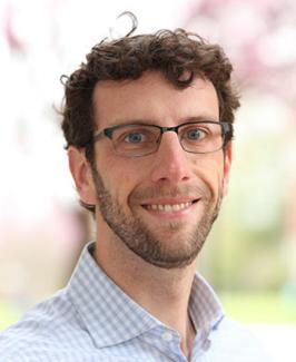 Professional headshot of Greg Erhardt.